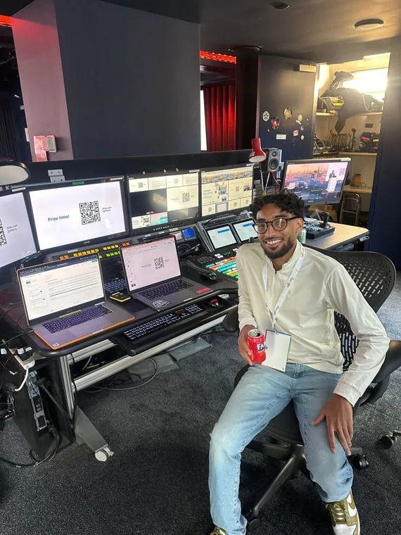 Sami at work behind the scenes in a control room